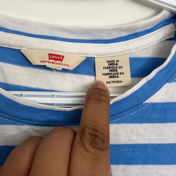 A white top with Blue stripes - Picture 2 of 4